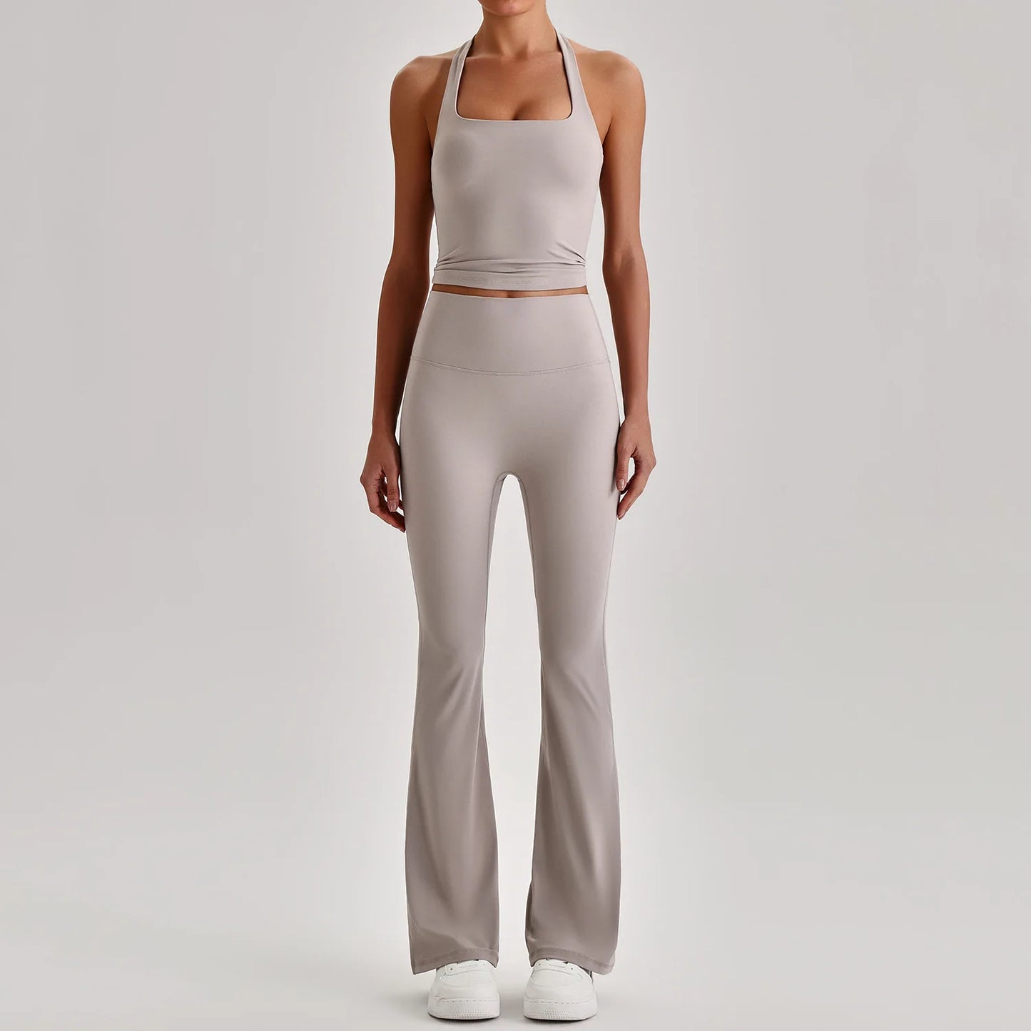 Women's plus size matching activewear set, halter neck crop top detail